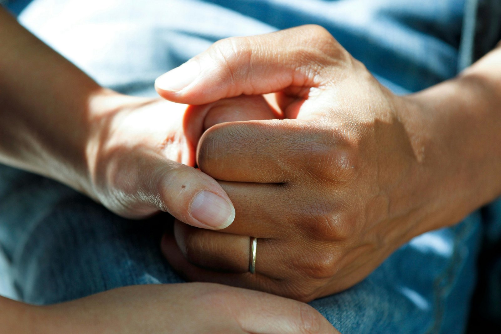 Supportive handhold representing approachable community contact